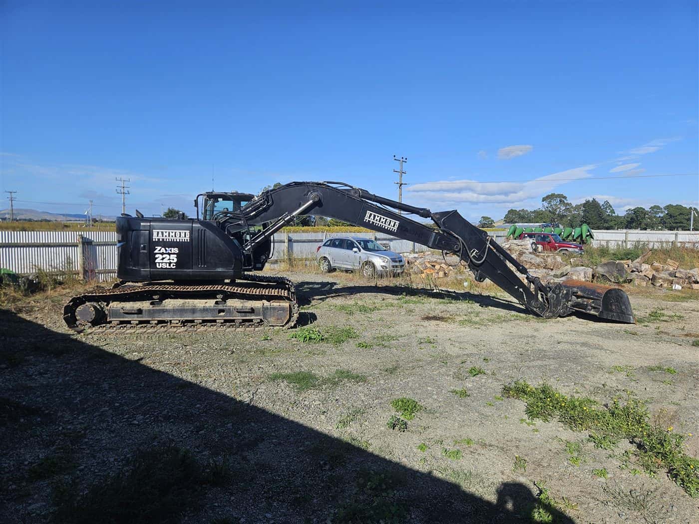 Hitachi ZAXIS 225 tracked excavator parked in a Hawke’s Bay yard